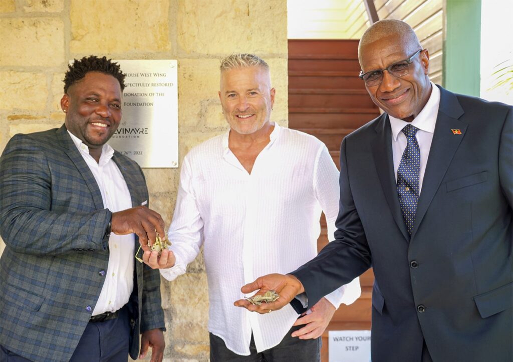 His Excellencies, Sir Rodney Williams and Ambassador Calvin Ayre with the newly restored West Wing building keys